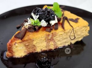 A piece of Cheesecake on a plate