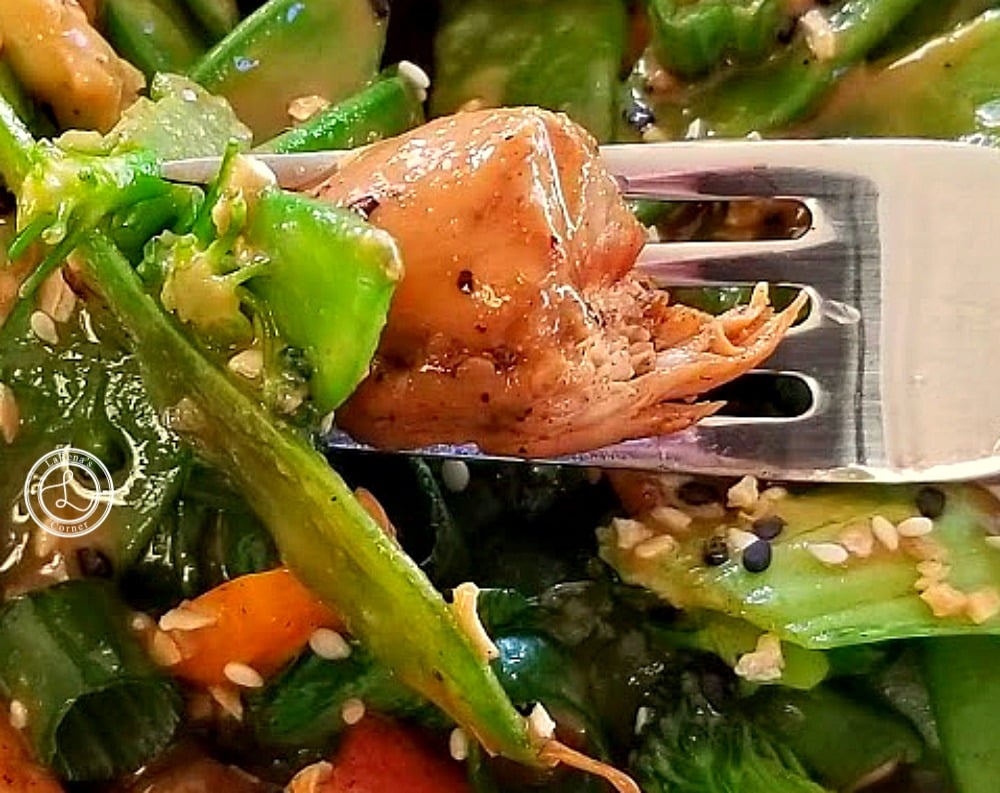 Gluten-Free Father's Day Menu Close up picture of a bite on a fork of Chicken Stir Fry