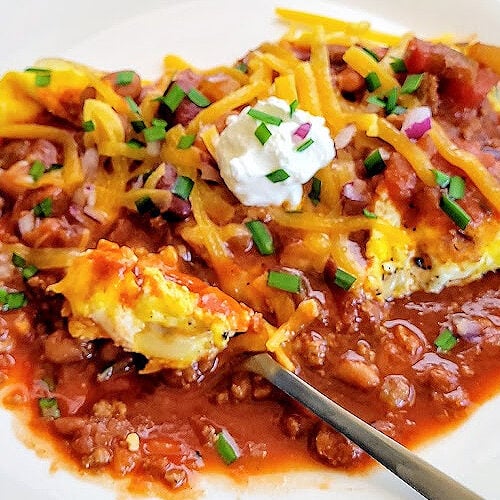Chili Cheese Scramble Recipe the perfect cheesy gooey breakfast.