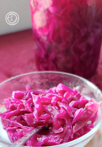 Cabbage in a bowl and in a quart jar
