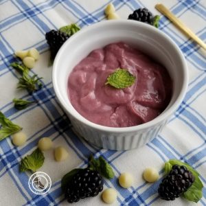 Refined Sugar-Free Blackberry Curd with a sprig of mint
