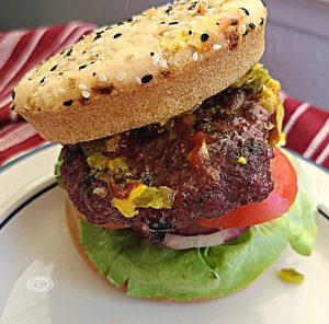 BBQ Spice Burgers The burger with gluten-free bun on a plate.