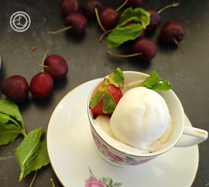 Dairy-Free Vanilla Ice Cream is a three ingredient soft serve pictured is a close up .
