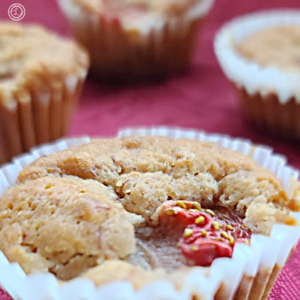 Glluten-Free Strawberry Banana Mini Muffins Recipe on a red tablecloth
