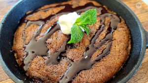 Gluten-Free Chocolate Chip Skillet Cookies in a 6-inch iron cast skillet