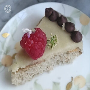 Gluten-Free Mini Almond Cake with marzipan frosting, fresh fruit, and chocolate chips