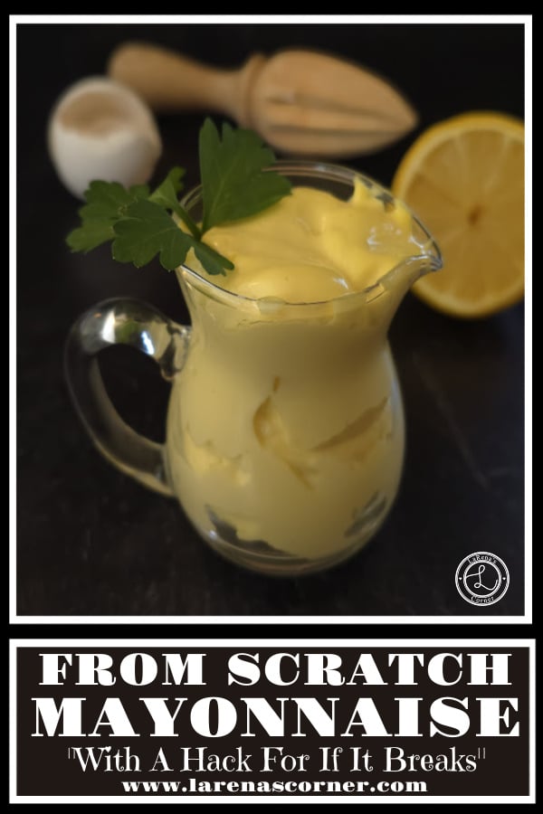Homemade Mayonnaise in a small pitcher with half a lemon, egg shell, and wooden juicer in the background.