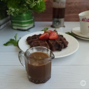 Dairy-Free Espresso Caramel Sauce in front of Chocolate Waffles