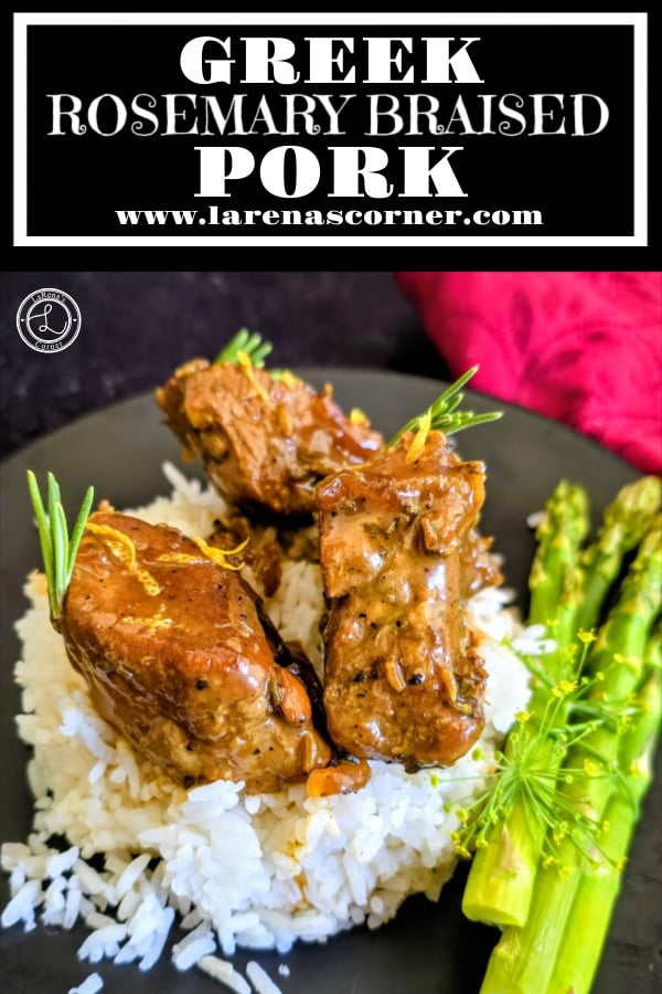 Greek Rosemary Braised Pork on top of rice and a side of asparagus. 
