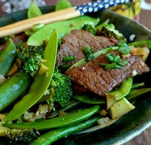 A close up of the Beef and Veggies with chopsticks to the side.