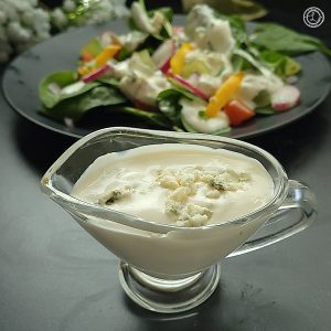 A serving size of dressing with crumbles in it.