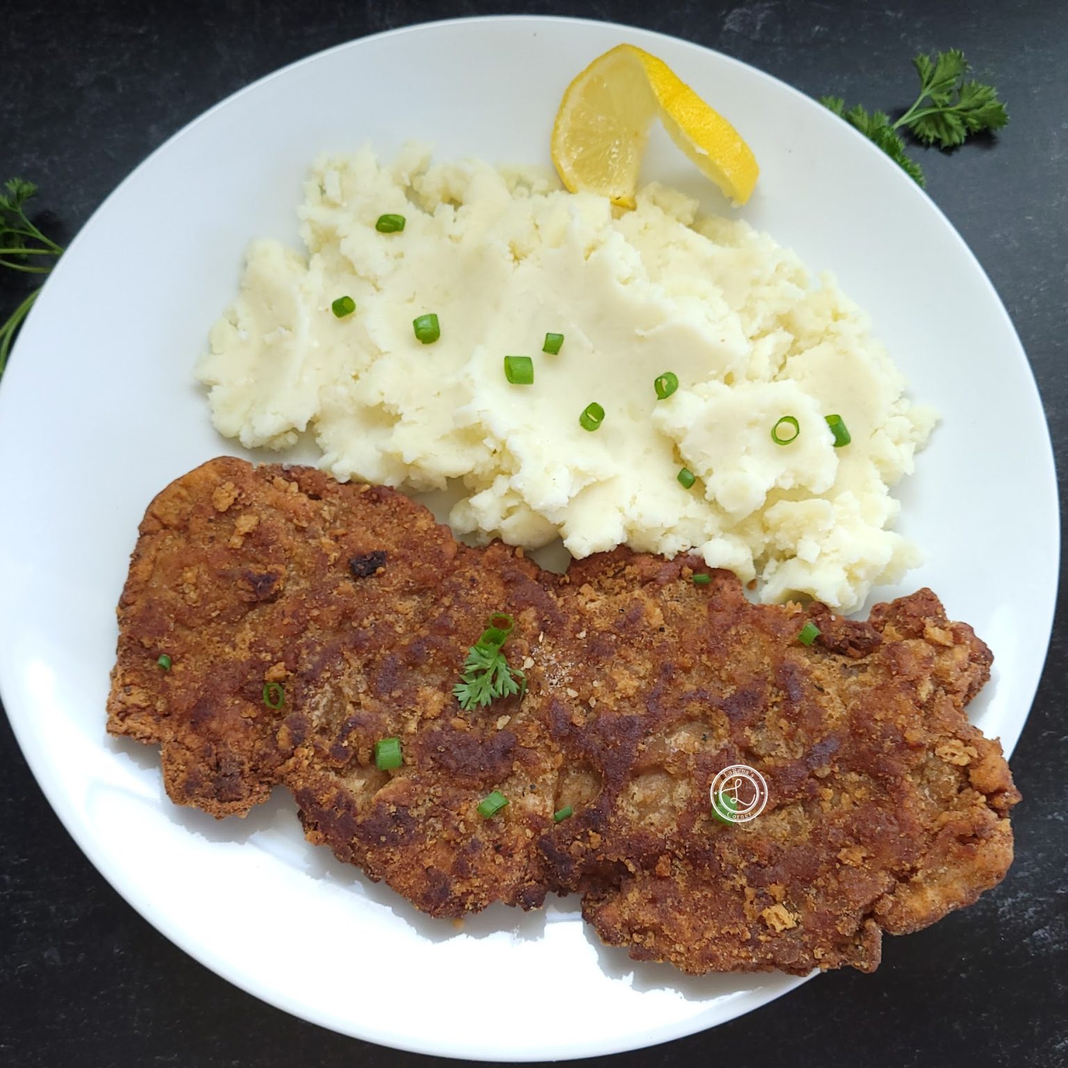 Gluten-Free Country-Fried Pork Chops Recipe and is crumb coated