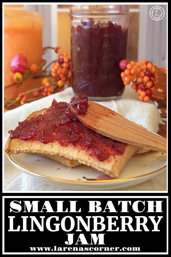 Small Batch Lingonberry Jam Recipe Small Batch Lingonberry Jam. Jam is being smeared on gluten-free bread with a jar of jam in the background. A candle and flowers are in the background.