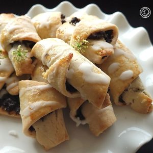 A corner shot of a Platter full of the gluten-free poppyseed rugelach.