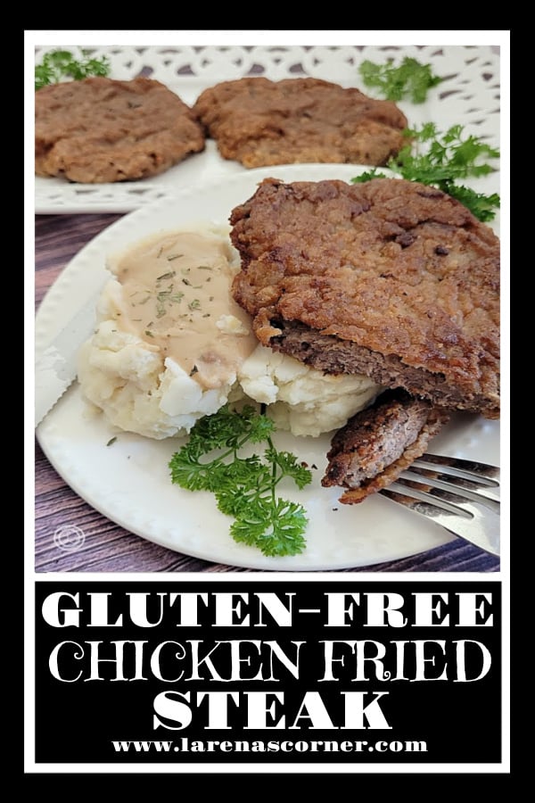 Gluten-Free Chicken Fried Steak Recipe Gluten-Free Chicken Fried Steak on a plate with mashed potatoes and a bite on a fork. More steaks in the background.