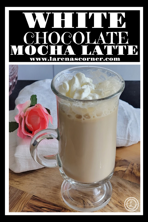 White Chocolate Mocha Latte Recipe White Chocolate Mocha Latte. A close up photo of a latte with whipped coconut milk whipped cream.