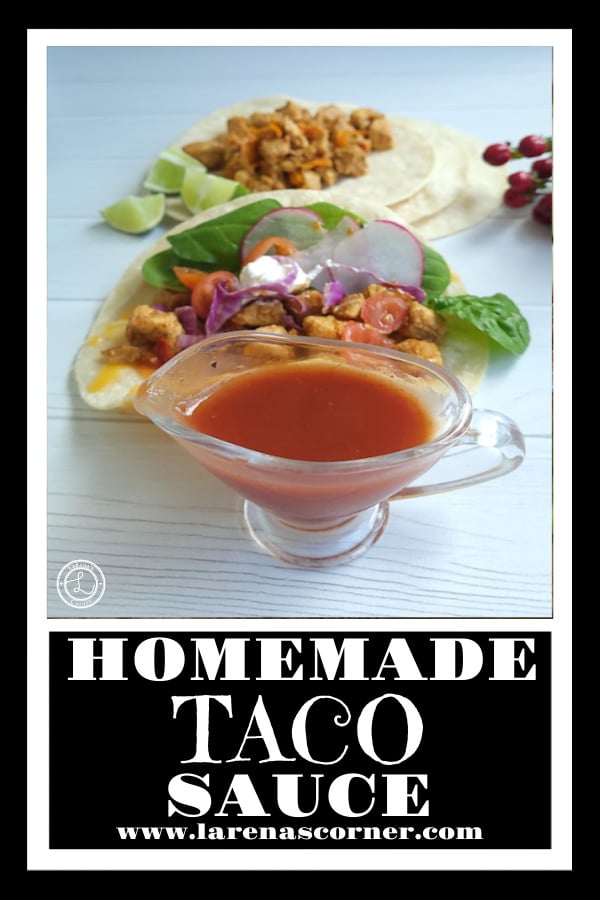 Homemade Taco Sauce in a small pitcher with tacos in the background.