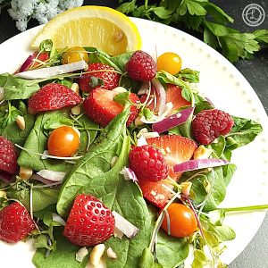 Spinach Strawberry Salad For-1 Recipe a corner shot of the salad.