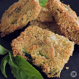 Gluten-Free Baked Zucchini Planks a photo of a close up stack.